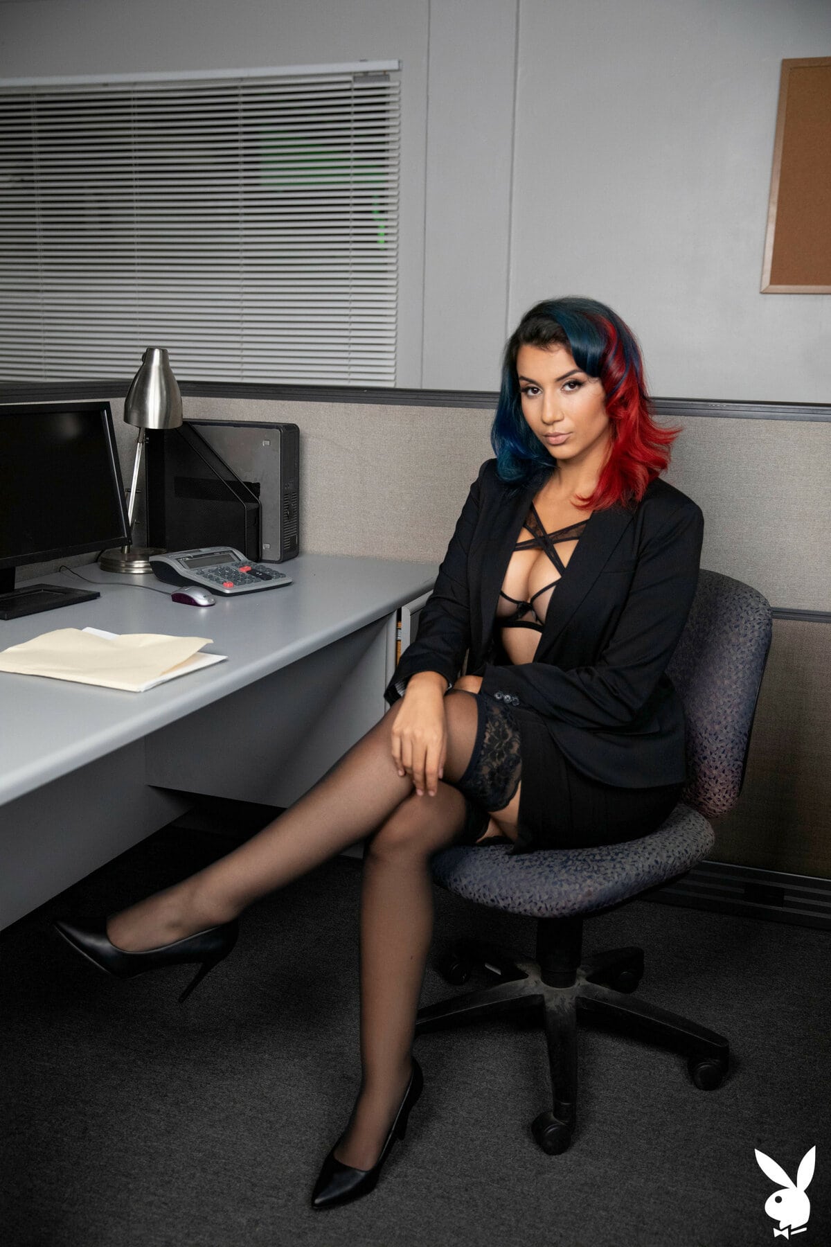 Roxie Sinner takes down her office outfit and lingerie, exposing her busty figure