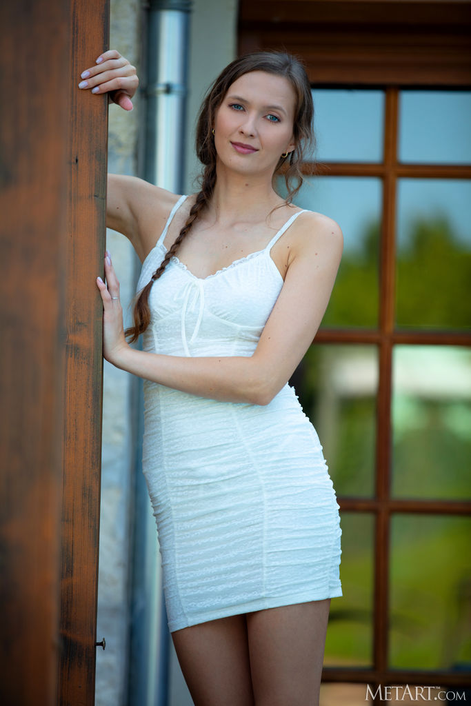 Stacy Cruz Strolls Out Onto The Terrace In A Tight White Dress That Hugs Her Sexy Curves