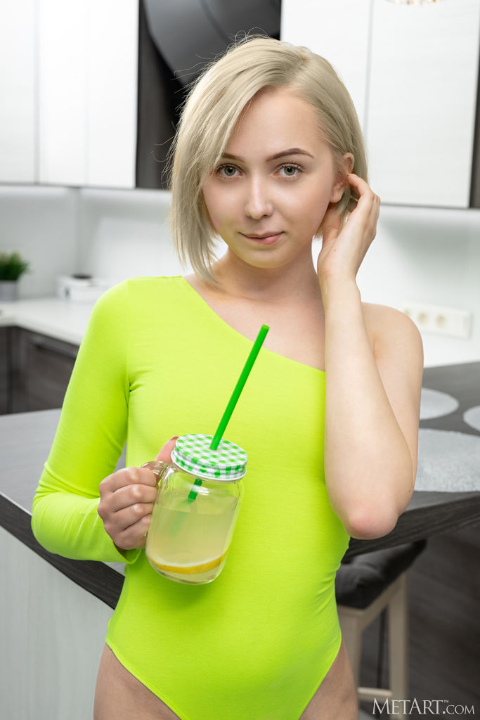 Bernie In Green Bodysuit That Hugs Her Sexy Ass Alluringly