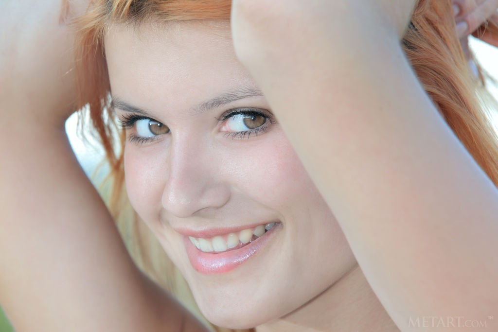 Violla A - Sizzling hot redhead gets naked during a walk