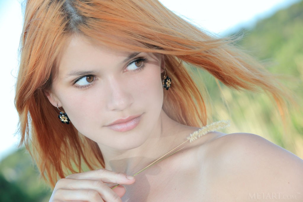 Violla A - Sizzling hot redhead gets naked during a walk