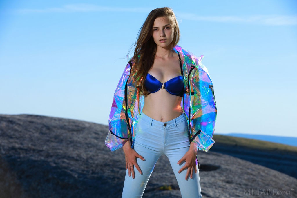 Elle Tan - Leggy babe with small tits strips her jeans off