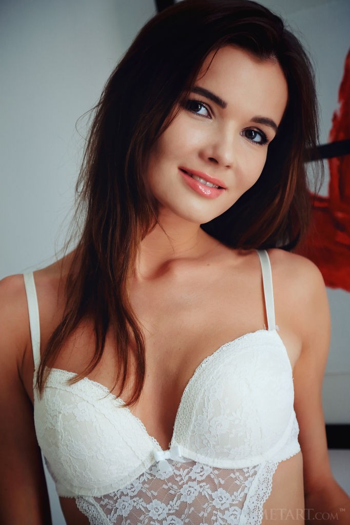 Brit - Passionate teen in white lingerie likes to spread her legs