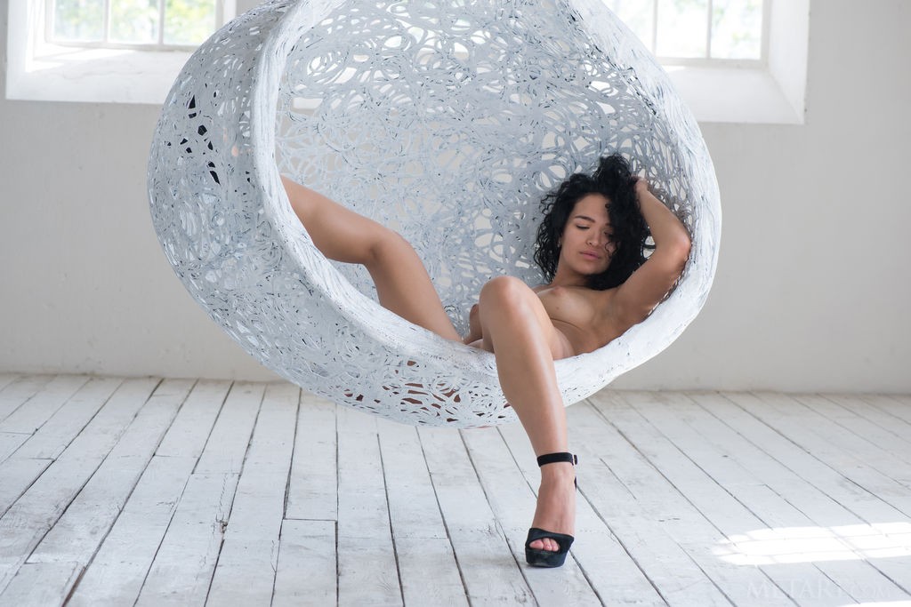 Yulianna - Posing nude and playing in a swing chair