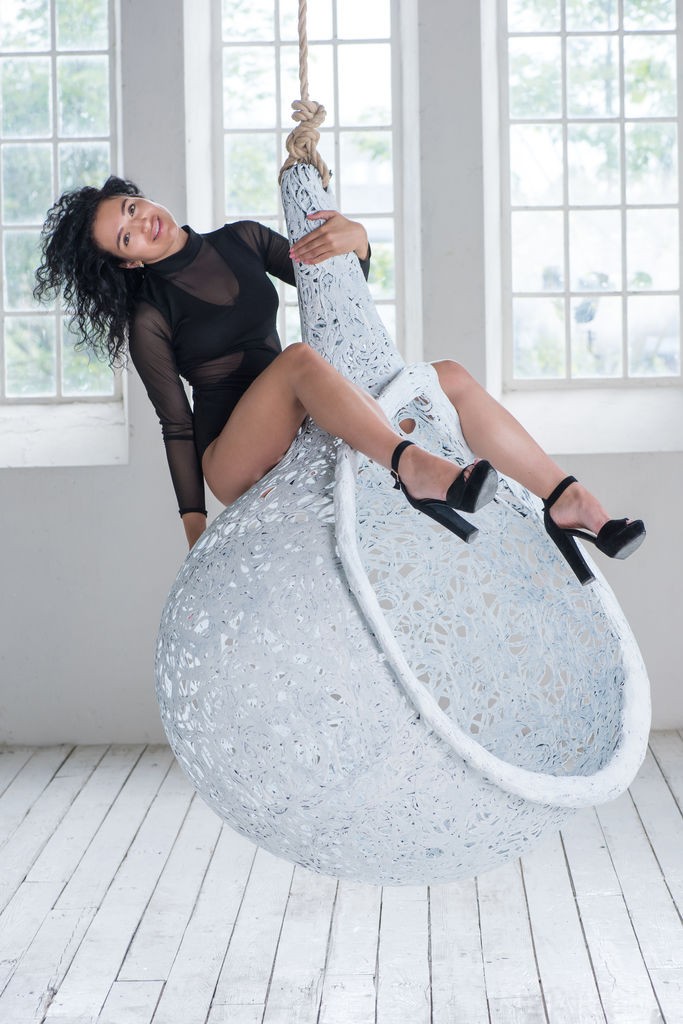 Yulianna - Posing nude and playing in a swing chair