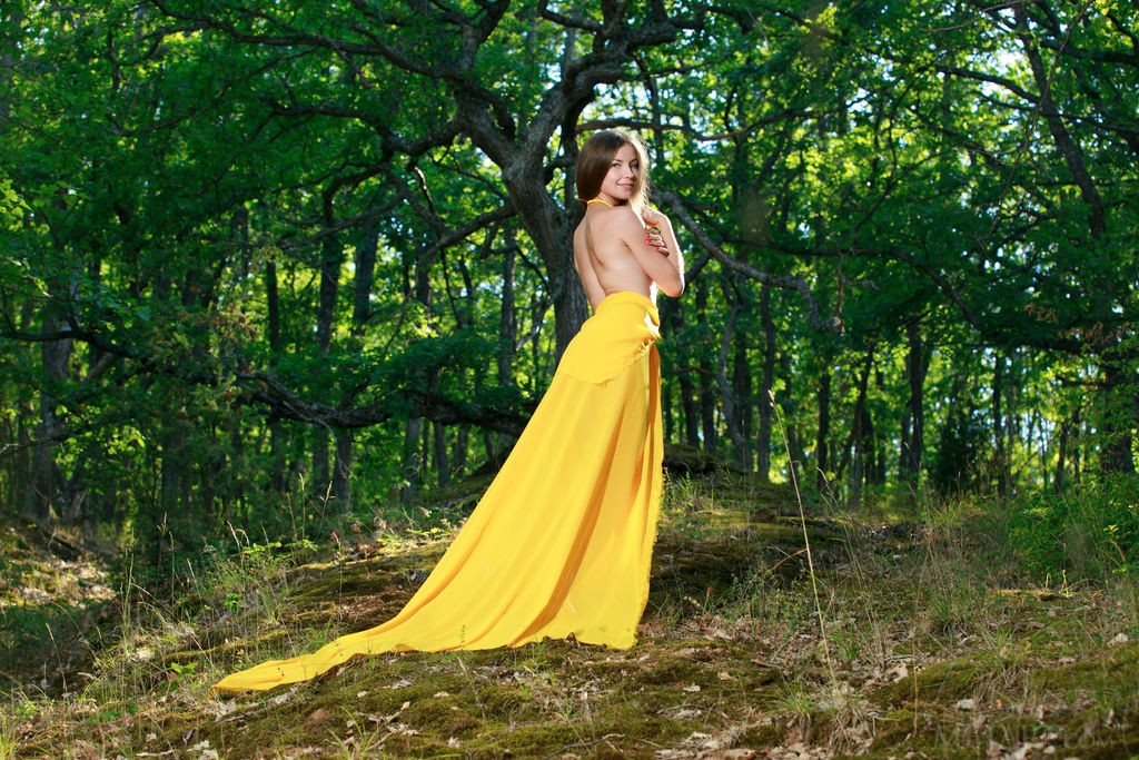 Vivian - Hot smoking brunette goes for a walk in a skirt only