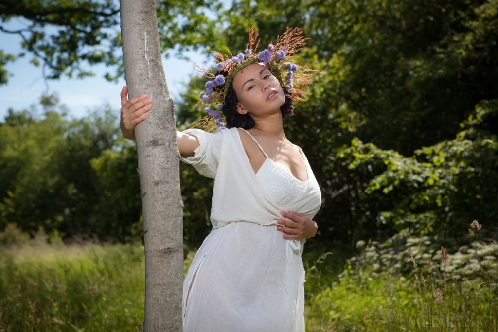 Pammie Lee - Ebony goddess undressing in the woods with flowers in hair