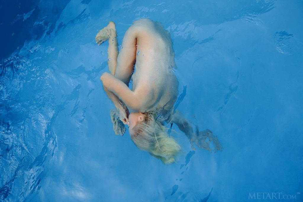 Janelle B - Relaxing by the pool in nude and taking a swim afterwards