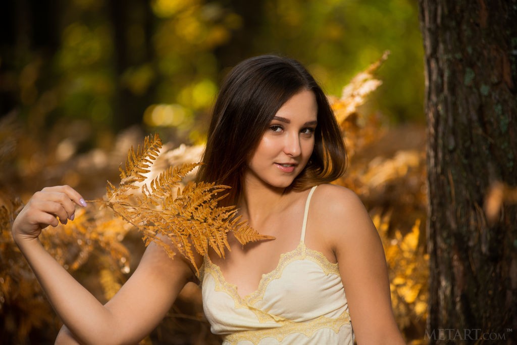 Ava - Leaves falling on a gorgeous nature loving brunette outdoors