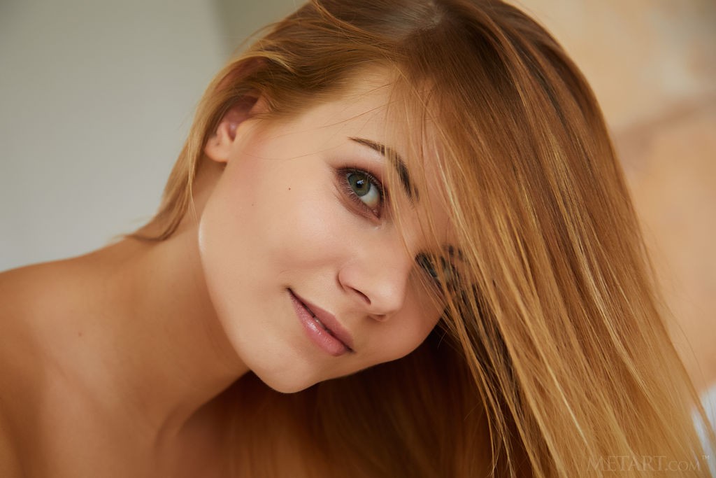 Nordica - Long haired blonde teen babe spreads her legs on the bed