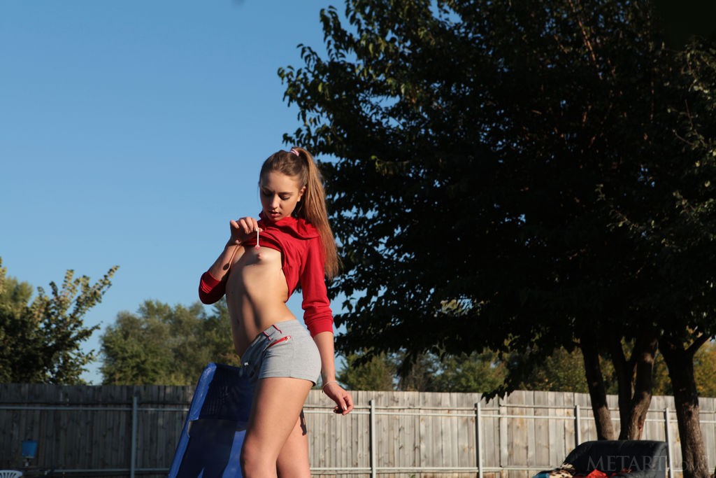 Valery Leche - Playful brunette takes off her clothes in the back yard