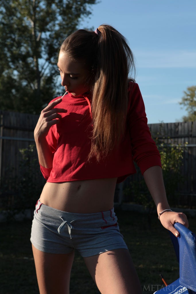 Valery Leche - Playful brunette takes off her clothes in the back yard
