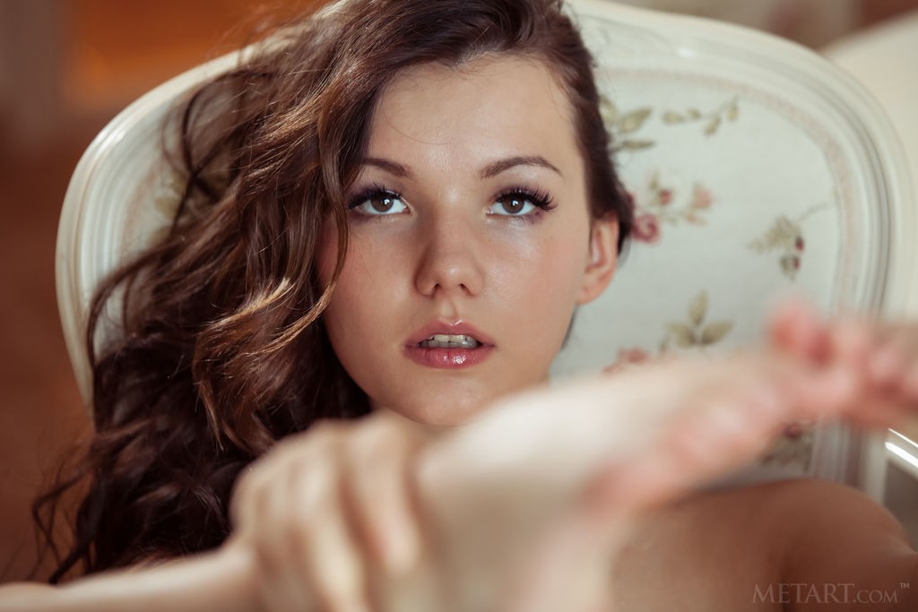 Iva - Curly red hair and a shaved pussy on a saloon chair