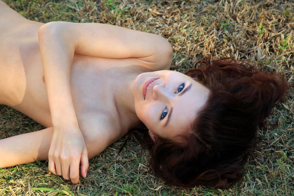 Berenice - Exhibitionist gets naked and plays on her back deck