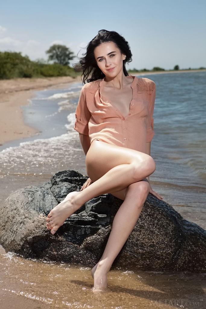 Mona - Fit babe naked and wet at the beach playing in the sand