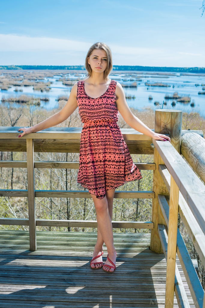 Yelena - During vacation she takes her dress off to get naked outside