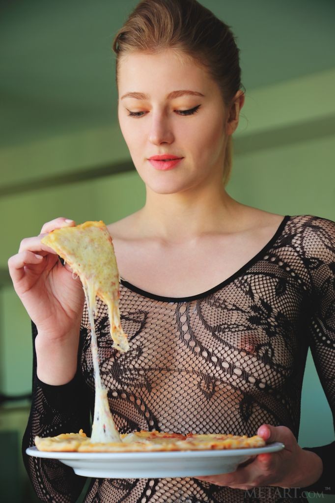 Mila I - Eating some pizza while slithering out of her lace bodysuit